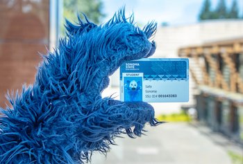 Lobo holding a Sonoma State University ID card