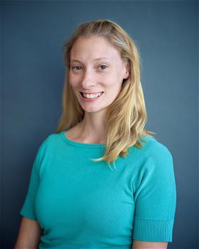 A portrait of Amy Furniss smiling