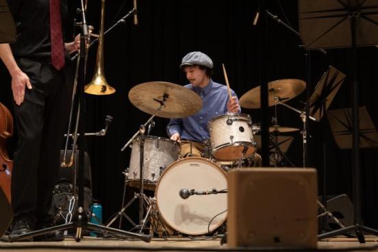 Person playing the drums