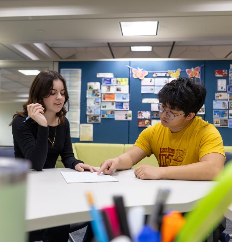Student at LARC office getting help from student tutor