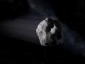 an asteroid flying through space