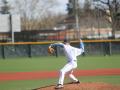 Student pitching a baseball 