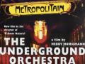 Film poster for 'The Underground Orchestra' featuring colorful stage lighting