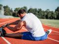 Track athlete stretching 