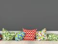 A row of multi-colored pillows with varying patterns 