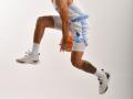 Sonoma State Men's Basketball player Julian Bryant dribbling a basketball between his legs