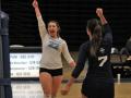 SSU volleyball players raising their fist in celebration