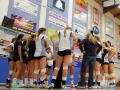 SSU's women's volleyball team crowded in a huddle