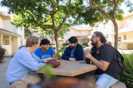 Students sitting around a table 