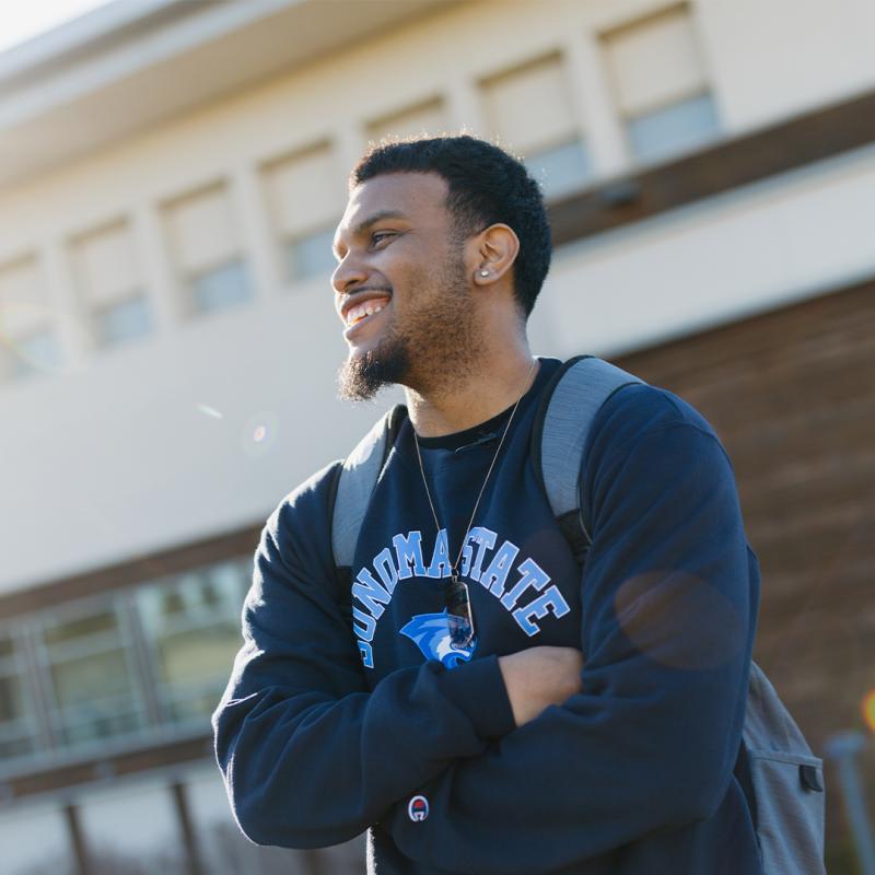 Transfer student looking away at the Green Music Center